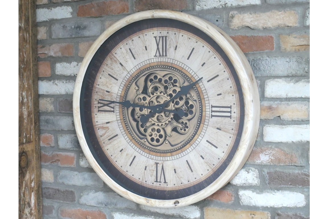 Large cream wall clock with moving brass cog detail