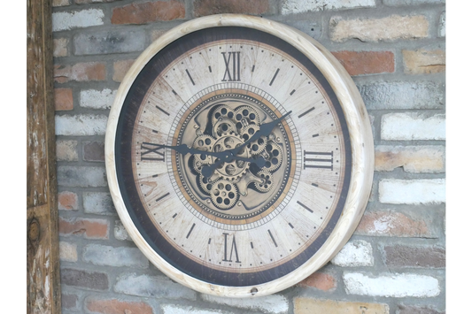 Large cream wall clock with moving brass cog detail