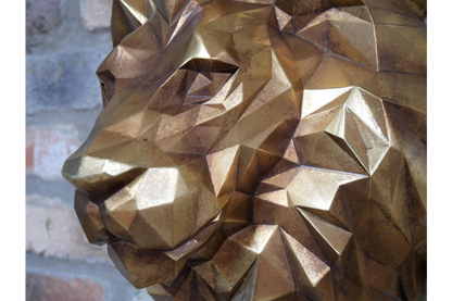Gold geometric lion head wall sculpture