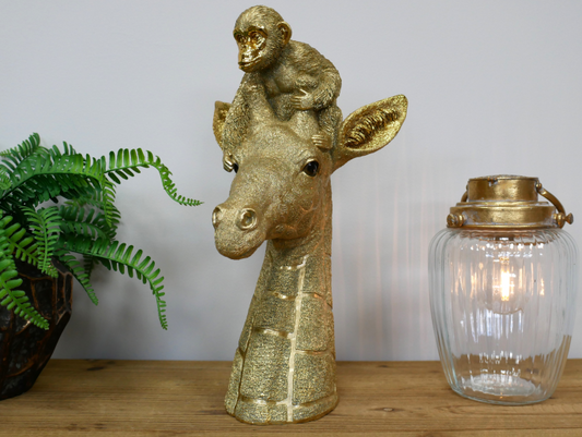 Gold giraffe and monkey decorative statue