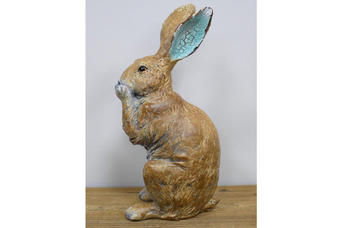 Rustic laughing rabbit statue for home or garden