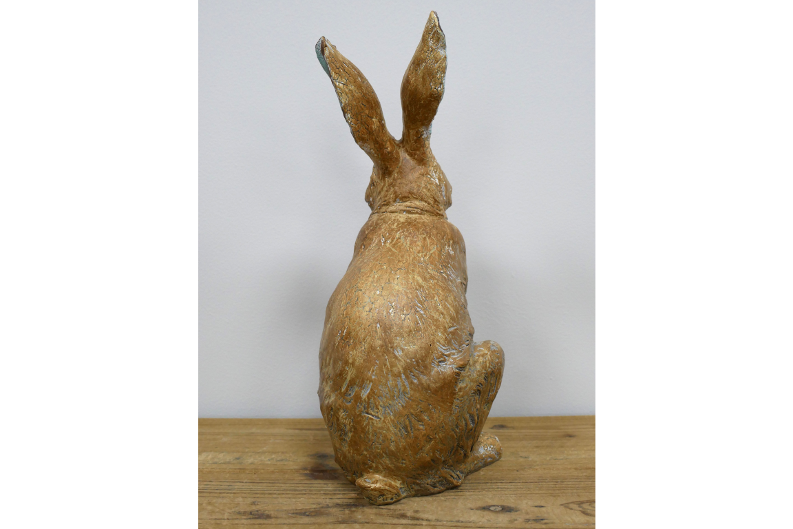 Rustic laughing rabbit statue for home or garden